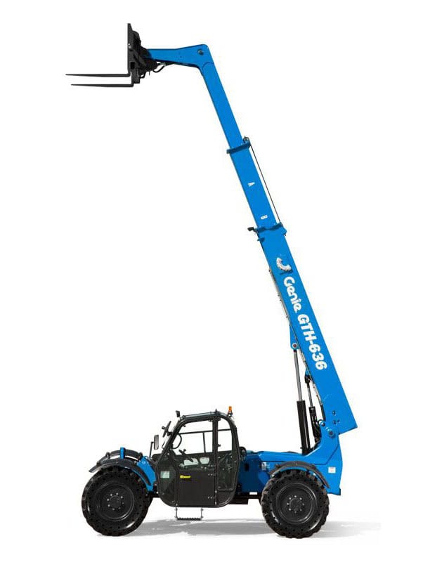 Blue telehandler lifting pallet with forks in industrial setting.